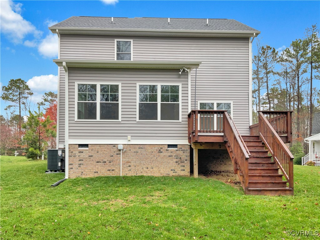 2206 White Oak Circle Aylett, VA 23009 - Photo 8 of 25 a view of a house with backyard