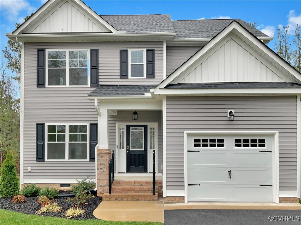 2206 White Oak Circle Aylett, VA 23009 - Photo 9 of 25 a front view of a house with white walls