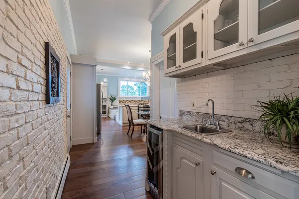 a kitchen with a stove and a sink