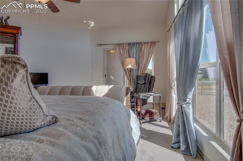 113 Rocchio Drive Florence, CO 81226 - Photo 20 of 34 a bed room with a bed and a chair