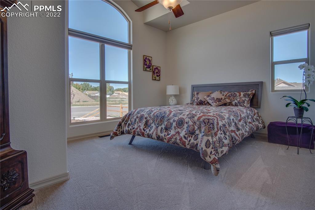 113 Rocchio Drive Florence, CO 81226 - Photo 30 of 34 a bedroom with a bed and a window