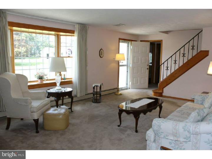 8 Tindall Road Robbinsville, NJ 08691 - Photo 3 of 21 a living room with furniture and a window