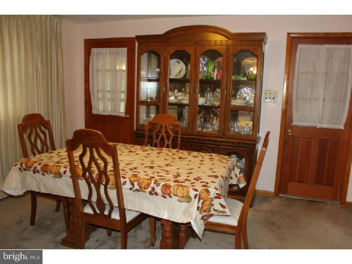 8 Tindall Road Robbinsville, NJ 08691 - Photo 8 of 21 a view of a dining room with furniture and window