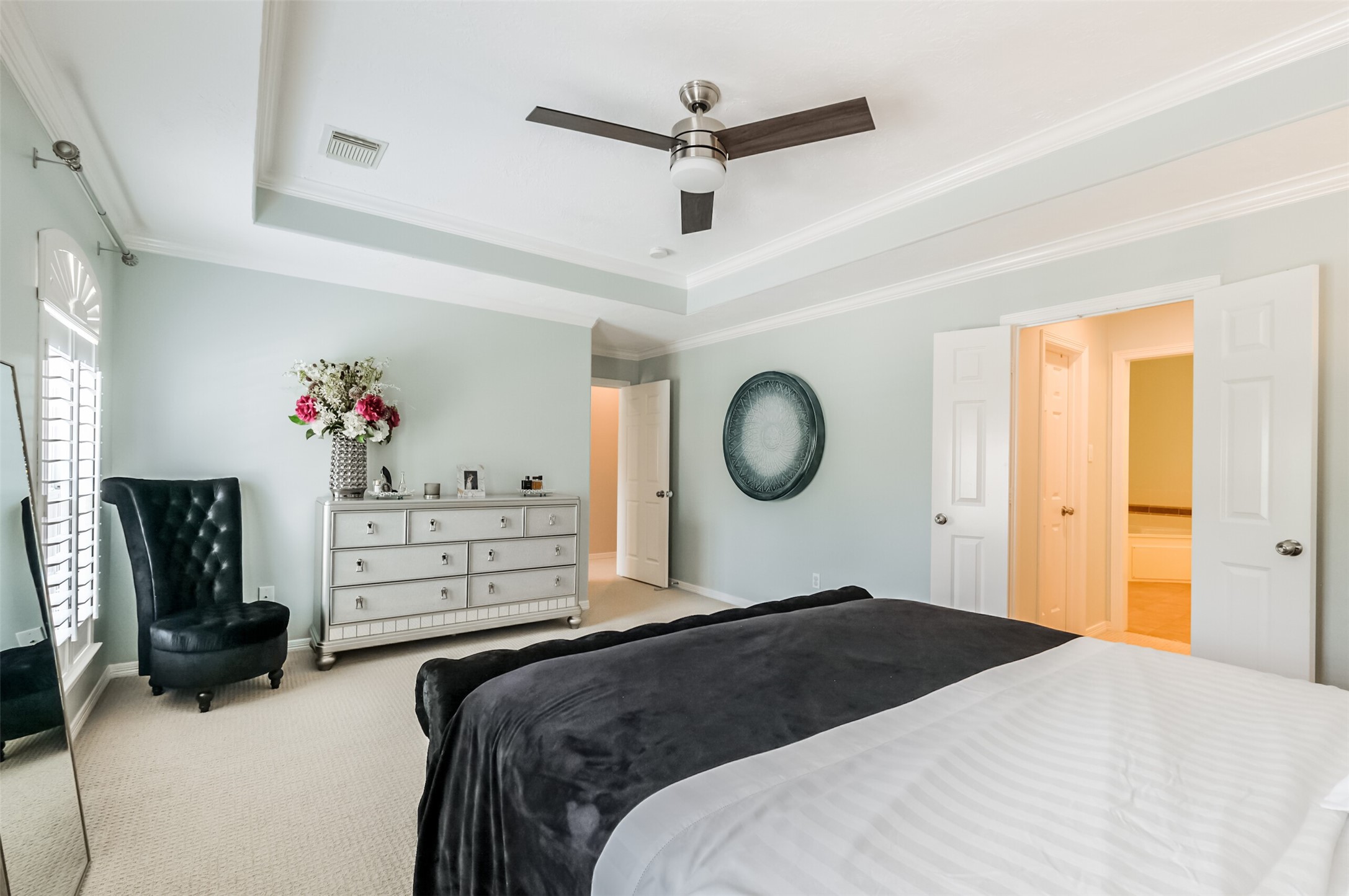 7515 Shady Villa Walk Houston, TX 77055 - Photo 11 of 23 Another angle of the primary suite with double doors opening to the primary bathroom.