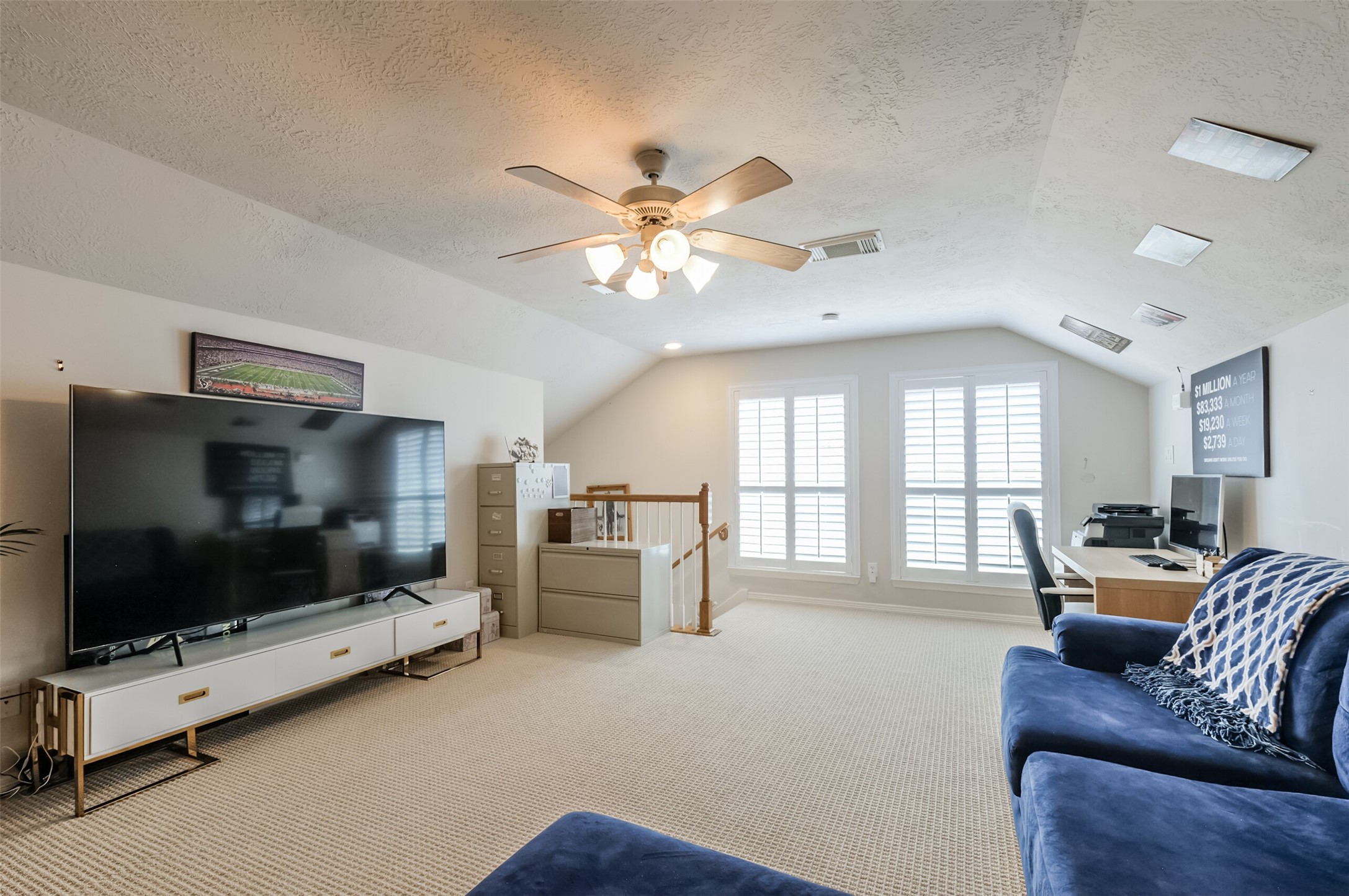 7515 Shady Villa Walk Houston, TX 77055 - Photo 16 of 23 Third floor room is a flexible space; could make an ideal game room, additional guest bedroom, study, workout space, you name it! Large room with ceiling fan, carpet, and plantation shutters.