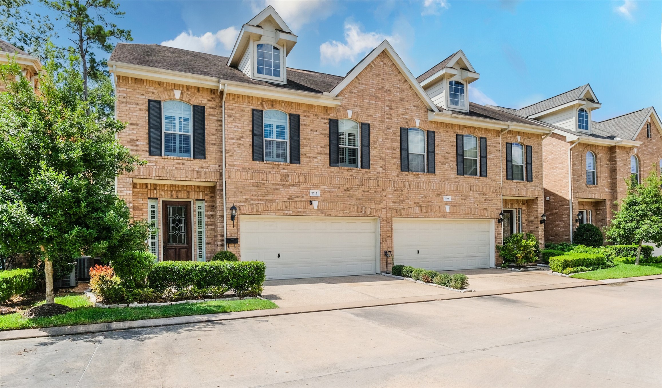 7515 Shady Villa Walk Houston, TX 77055 - Photo 2 of 23 Great curb appeal with a brick facade with two car attached garage. Double wide driveway.