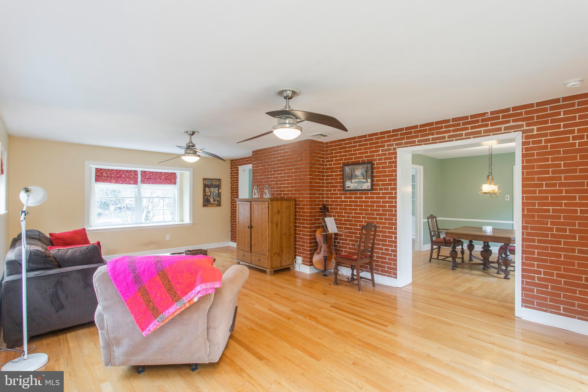 233 Barker Road Wyncote, PA 19095 - Photo 13 of 61 Exposed brick wall adds warmth and character