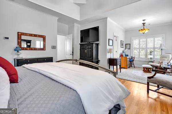 a bed room with a bed and a couch
