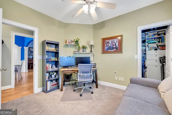 a bedroom with a bed and a cabinets