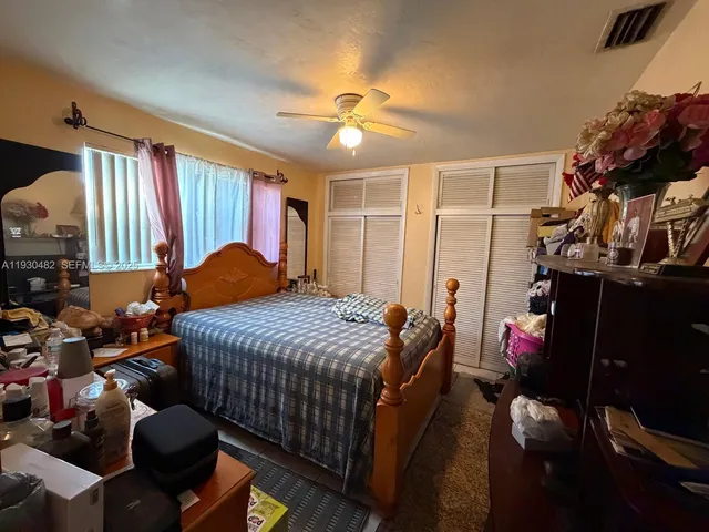 a view of living room with furniture and window