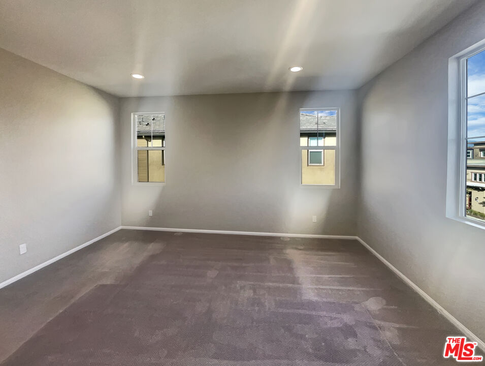 7396 Solstice Place Rancho Cucamonga, CA 91739 - Photo 5 of 18 a view of an empty room with a window