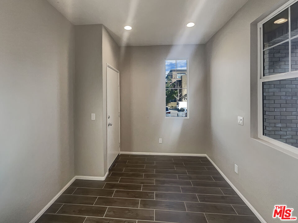 7396 Solstice Place Rancho Cucamonga, CA 91739 - Photo 7 of 18 a view of an empty room and window