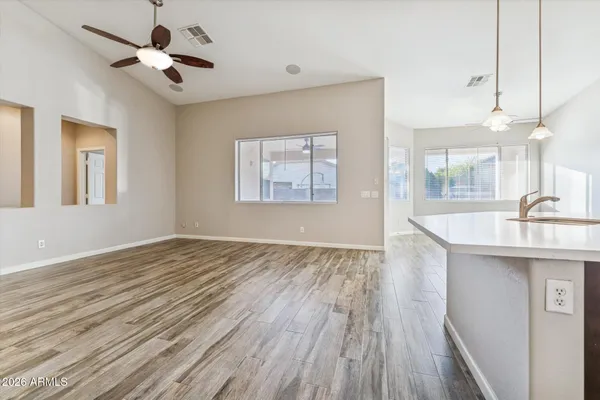 a view of a kitchen and a sink a window