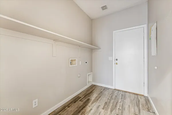 a view of small space with wooden floor