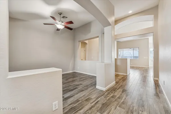 a view of a livingroom with wooden floor