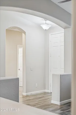 a view of a livingroom with wooden floor