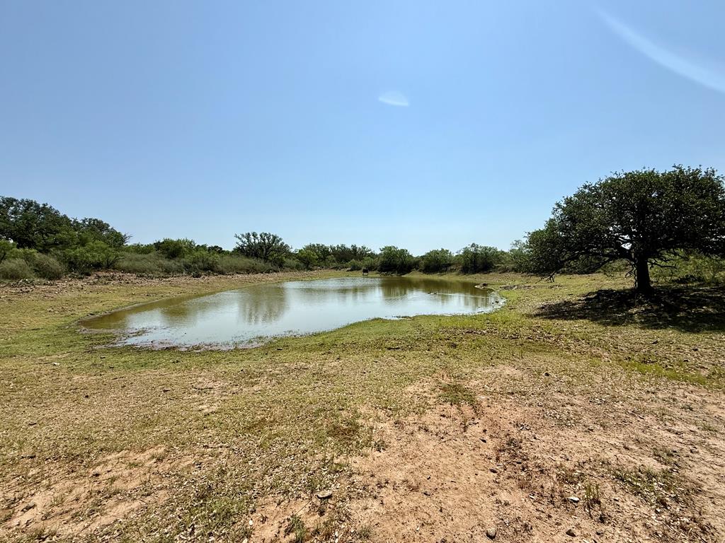 6501 Old Junction Road Mason, TX 76856 - Photo 5 of 26 a view of a lake with houses in the background