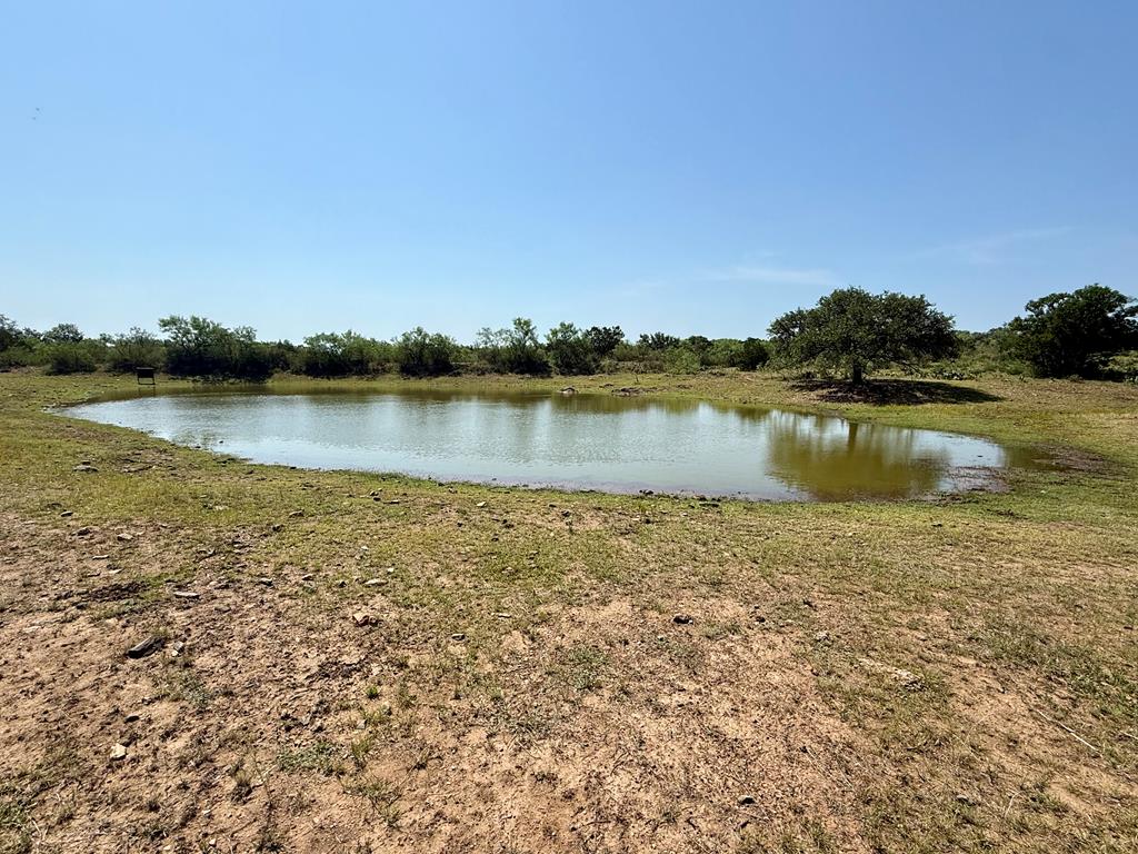 6501 Old Junction Road Mason, TX 76856 - Photo 7 of 26 a view of a lake with houses in the back