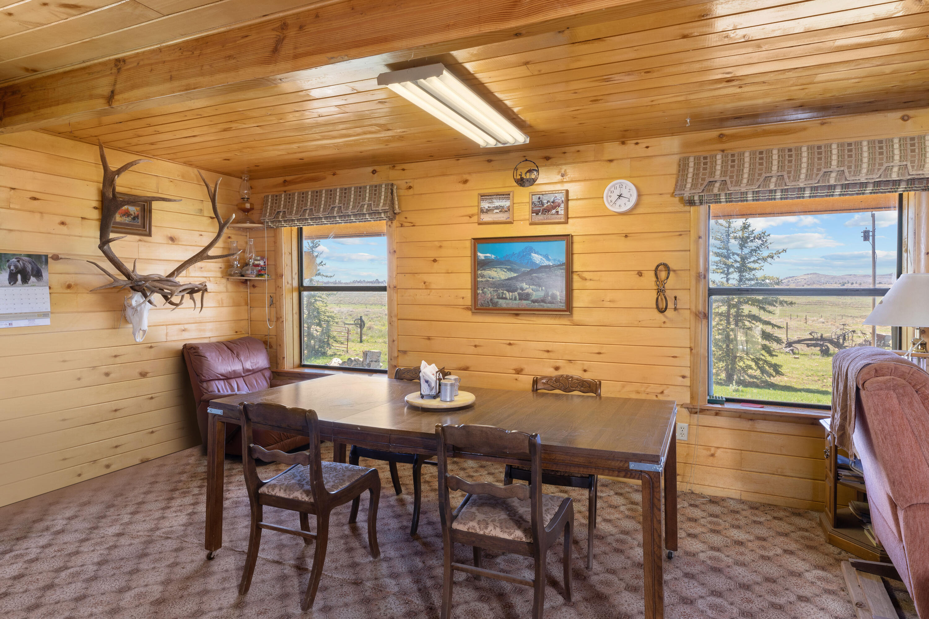 1692 County Road Placerville, CO 81430 - Photo 13 of 36 a view of a dining room with furniture and window