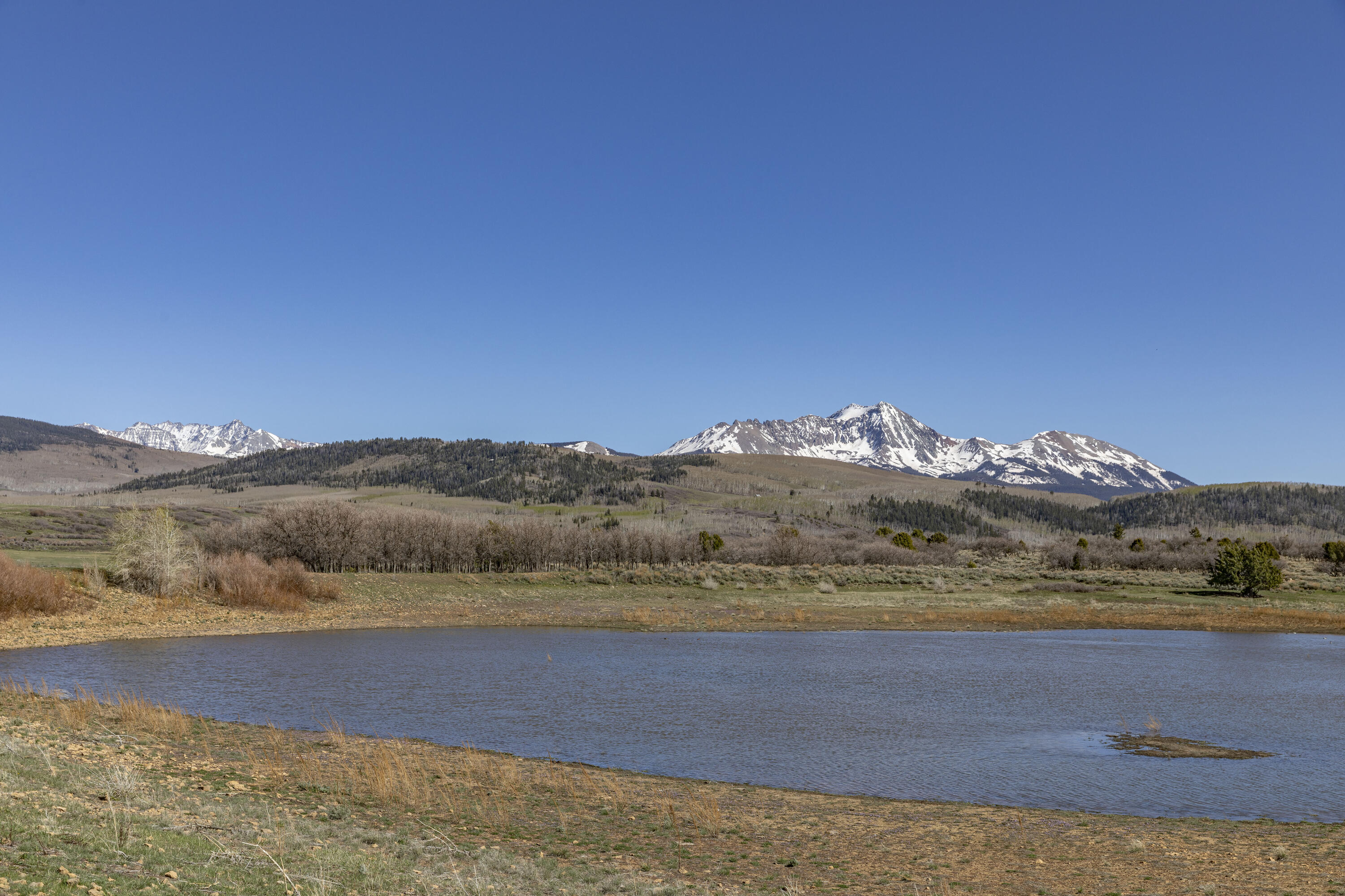 1692 County Road Placerville, CO 81430 - Photo 30 of 36 a view of an lake and mountain