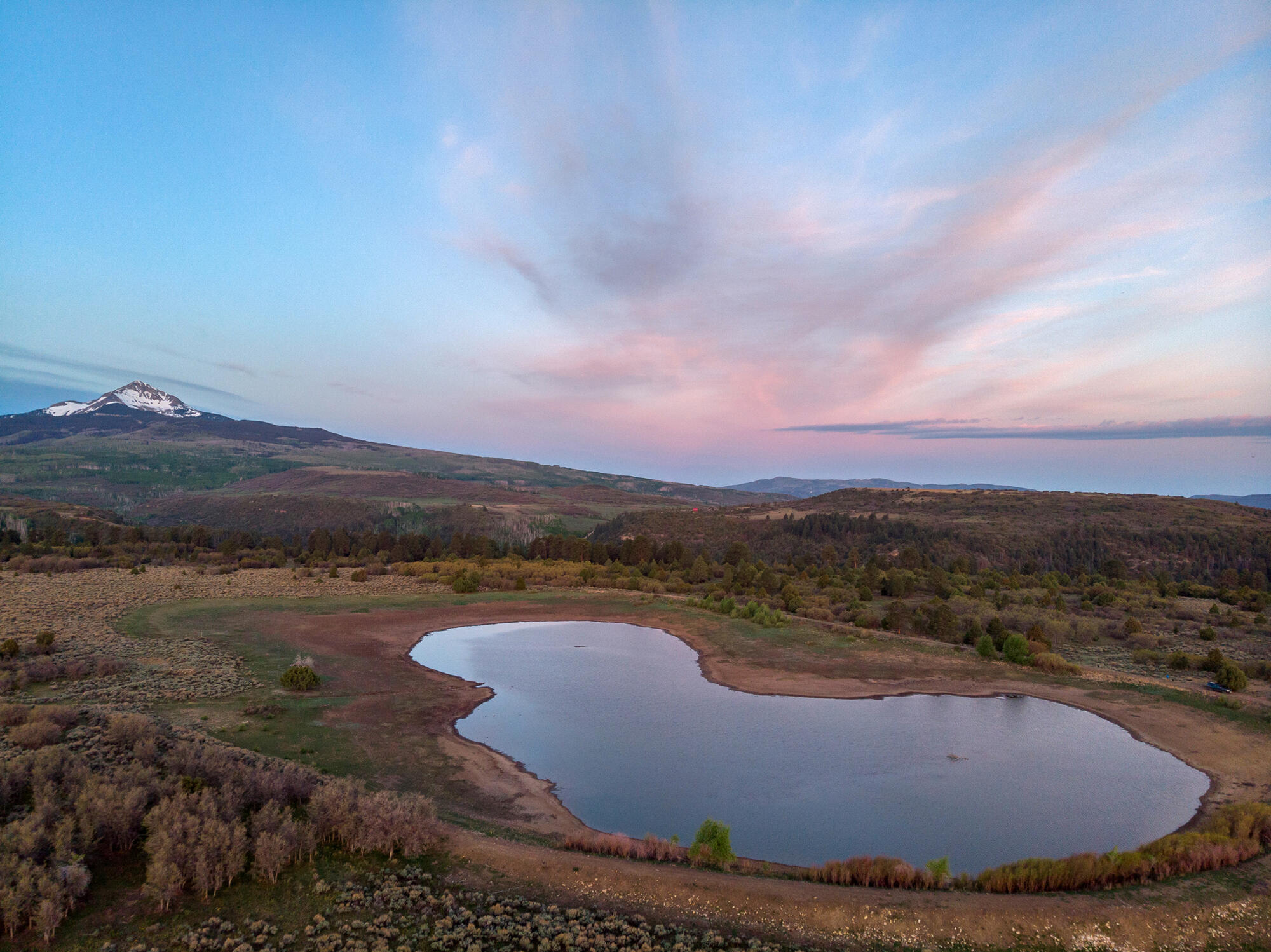 1692 County Road Placerville, CO 81430 - Photo 34 of 36 a view of a lake with a mountain