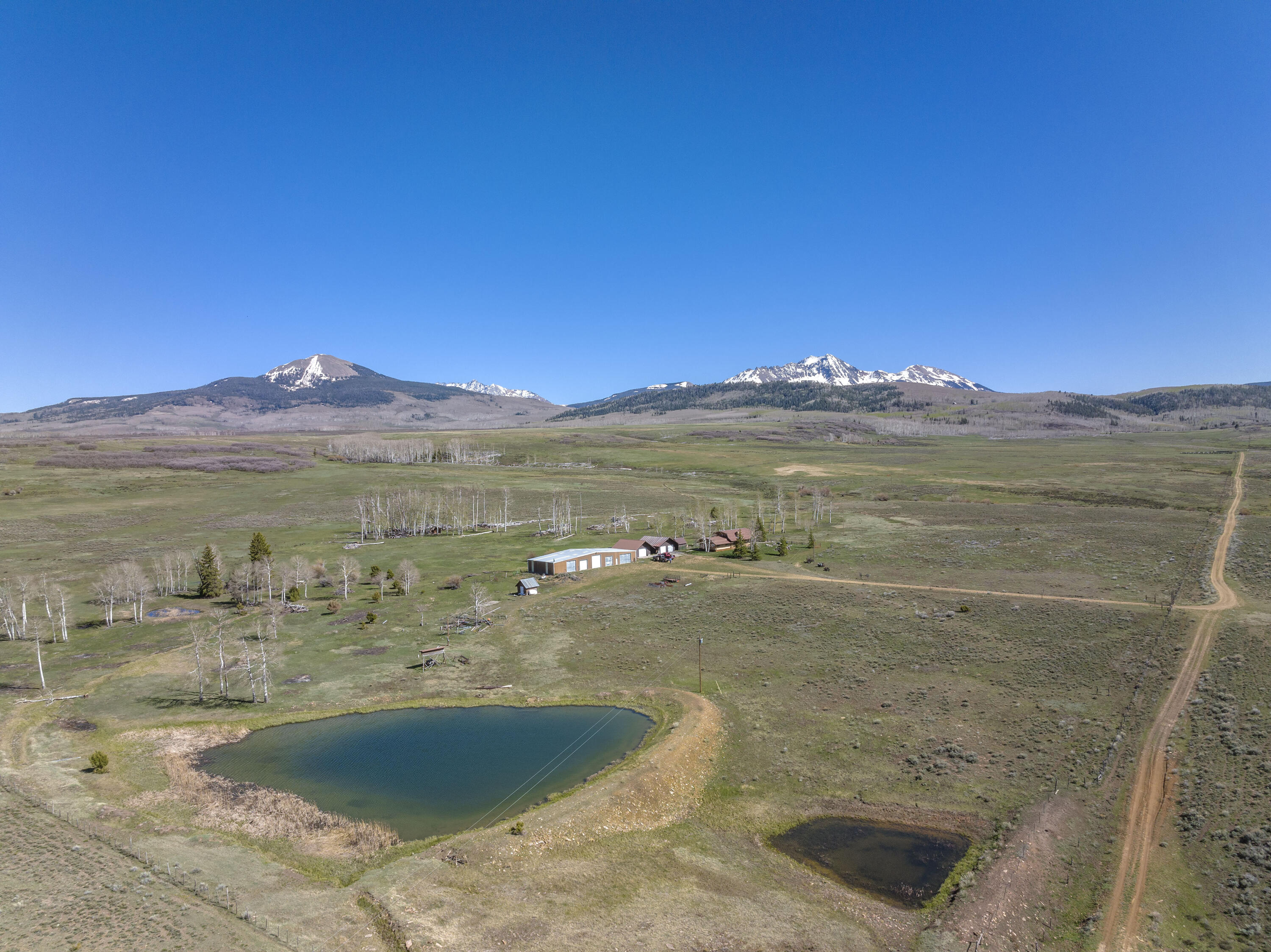 1692 County Road Placerville, CO 81430 - Photo 6 of 36 a view of a lake in middle of the town