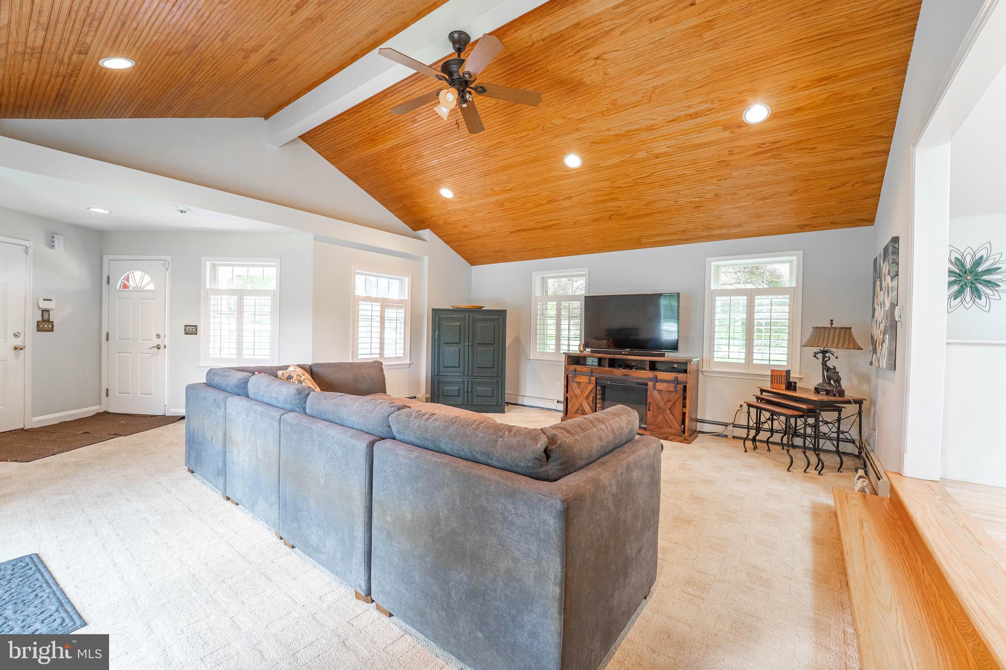 605 St Francis Road Baltimore, MD 21286 - Photo 14 of 56 a living room with furniture and a flat screen tv