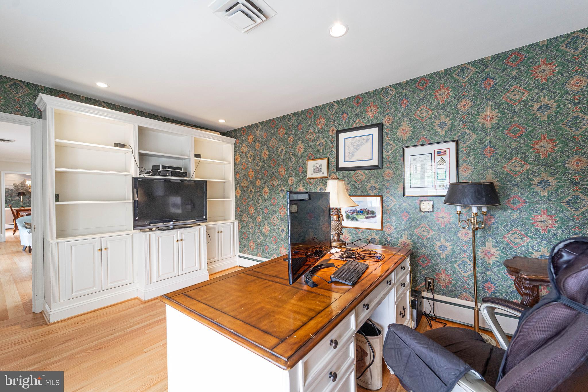 605 St Francis Road Baltimore, MD 21286 - Photo 27 of 56 a living room with furniture and a flat screen tv