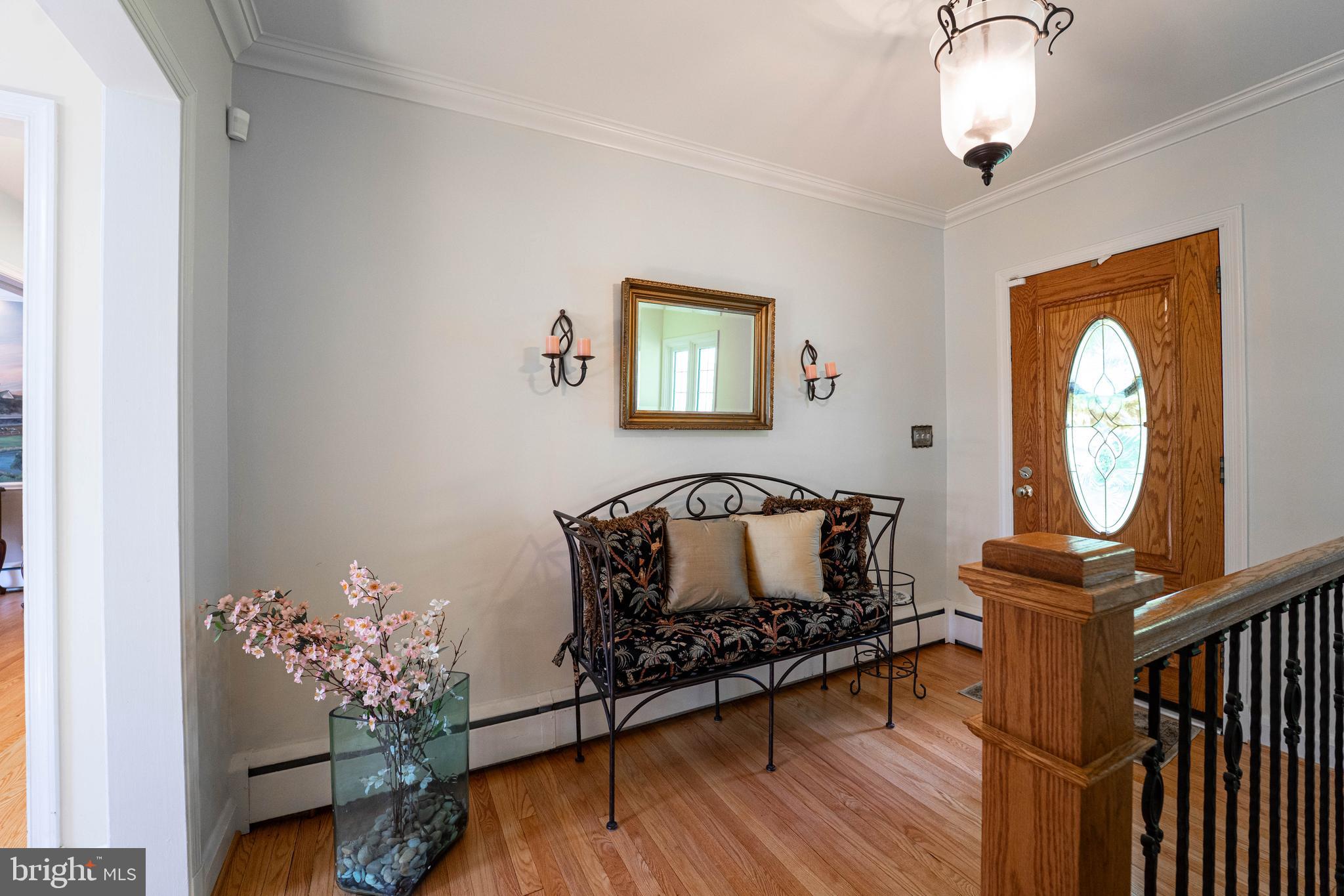 605 St Francis Road Baltimore, MD 21286 - Photo 38 of 56 a living room with furniture and a chandelier