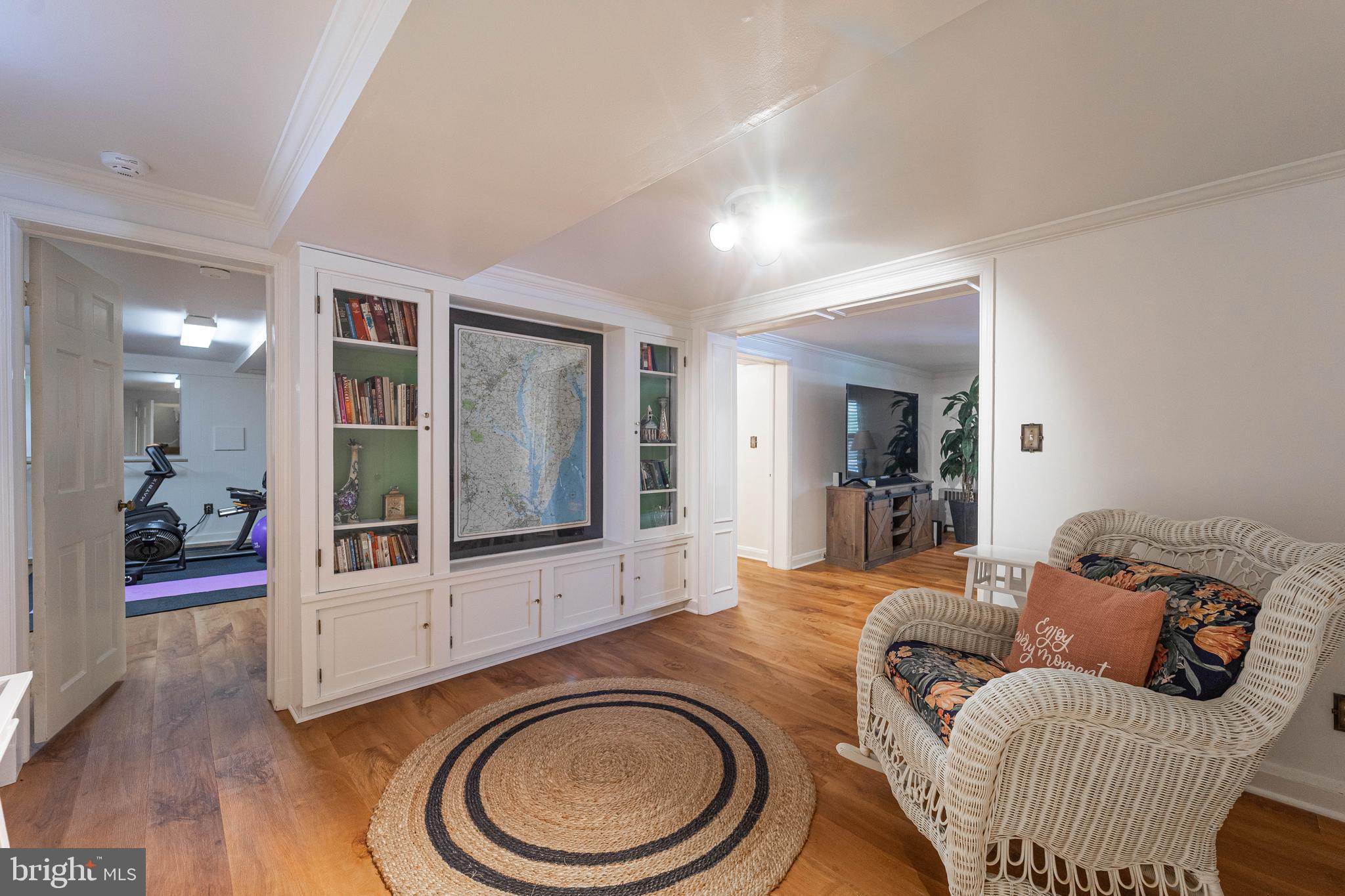 605 St Francis Road Baltimore, MD 21286 - Photo 39 of 56 a living room with furniture a window and a flat screen tv