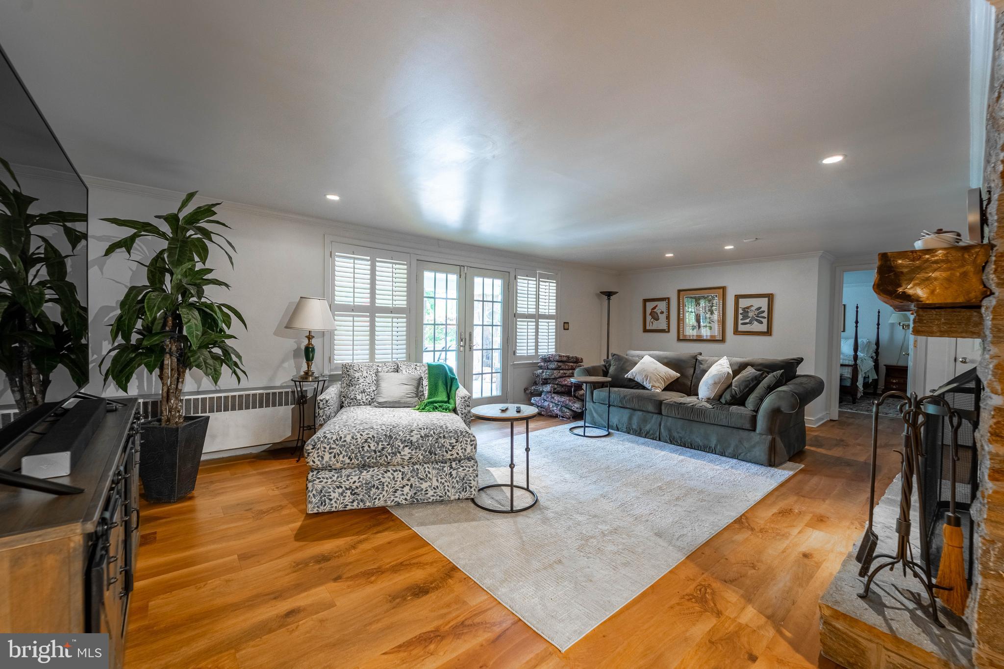 605 St Francis Road Baltimore, MD 21286 - Photo 40 of 56 a living room with furniture and a wooden floor