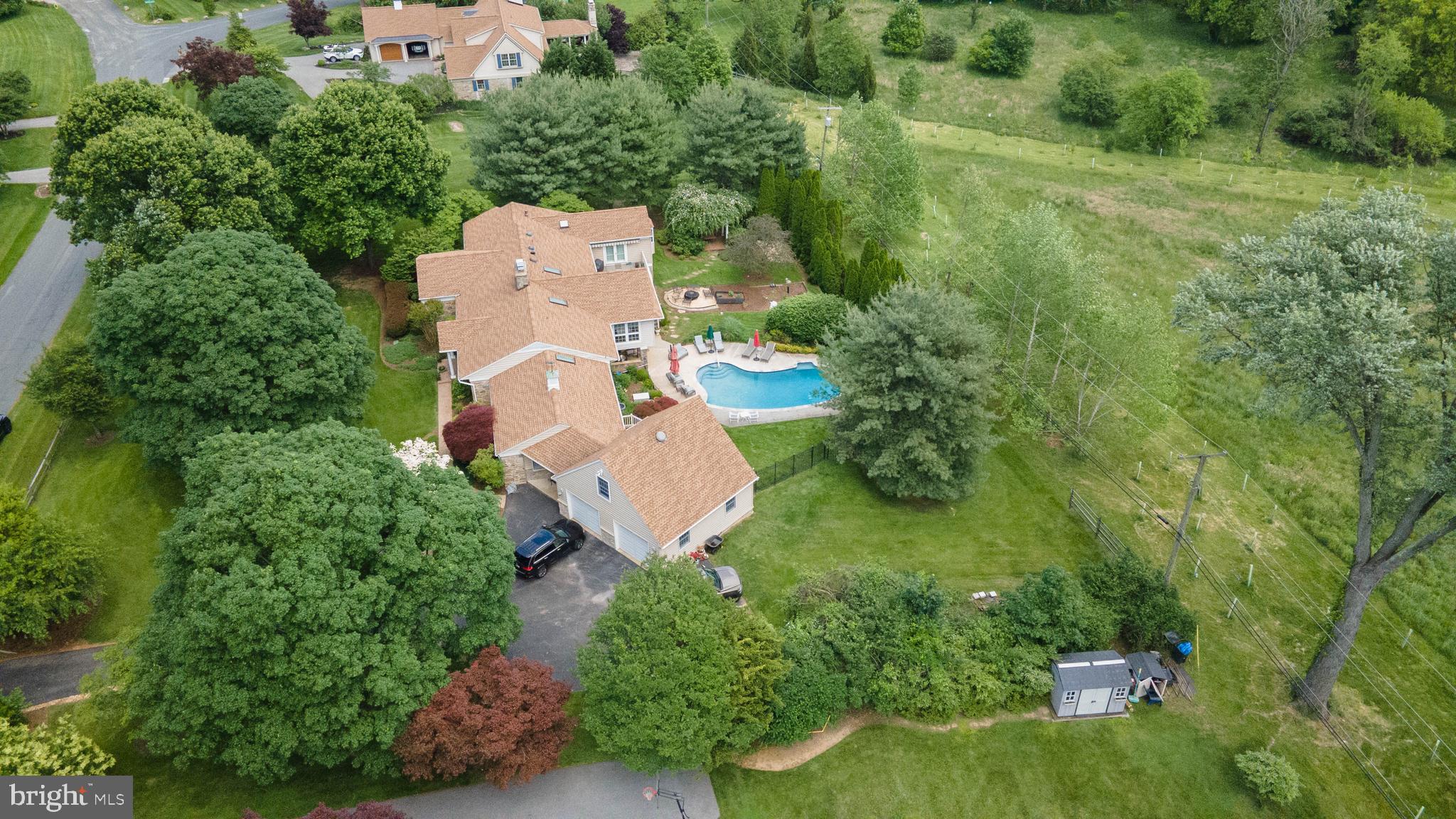 605 St Francis Road Baltimore, MD 21286 - Photo 4 of 56 an aerial view of residential house with outdoor space and trees all around