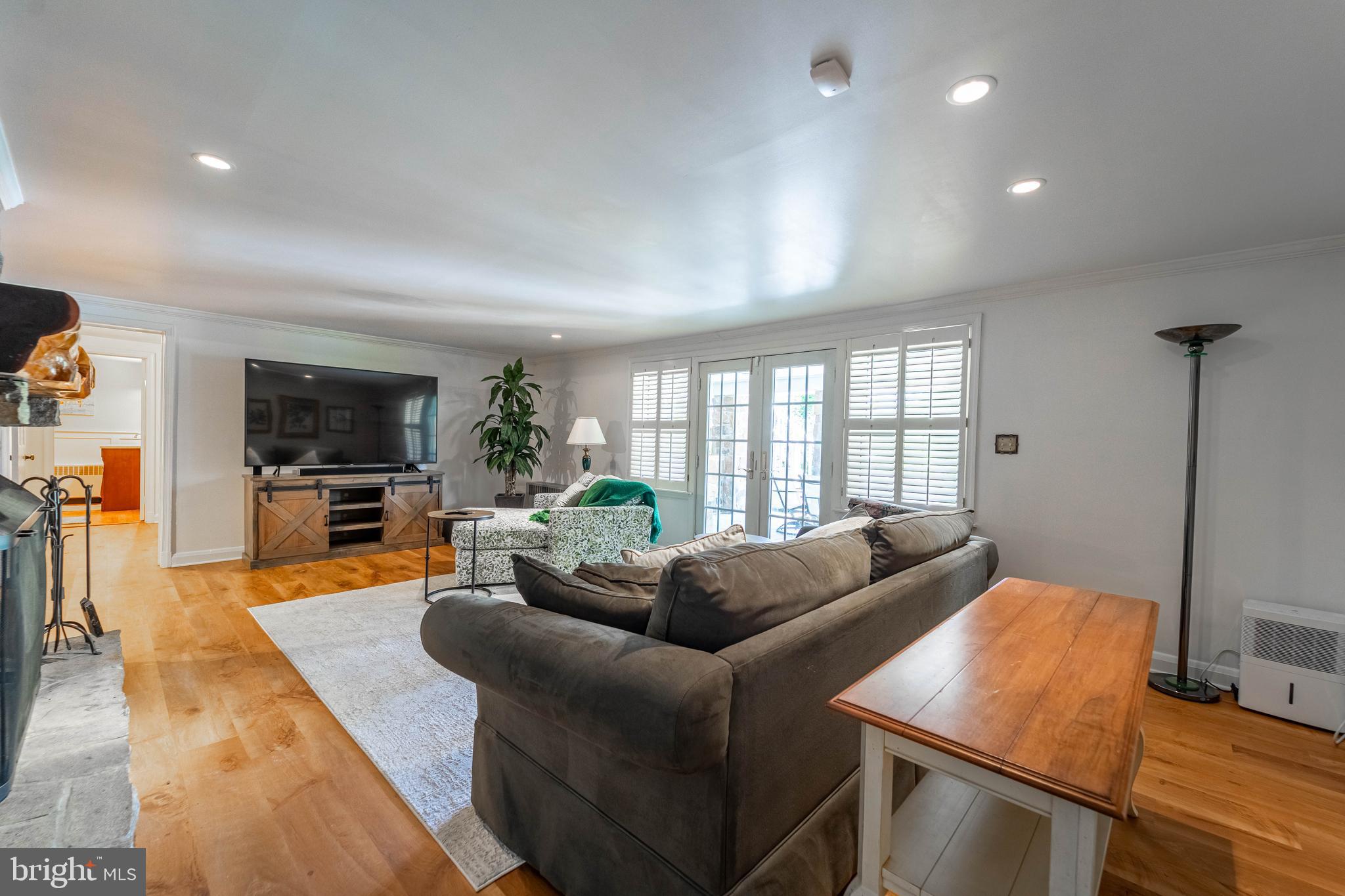 605 St Francis Road Baltimore, MD 21286 - Photo 42 of 56 a living room with furniture and a flat screen tv