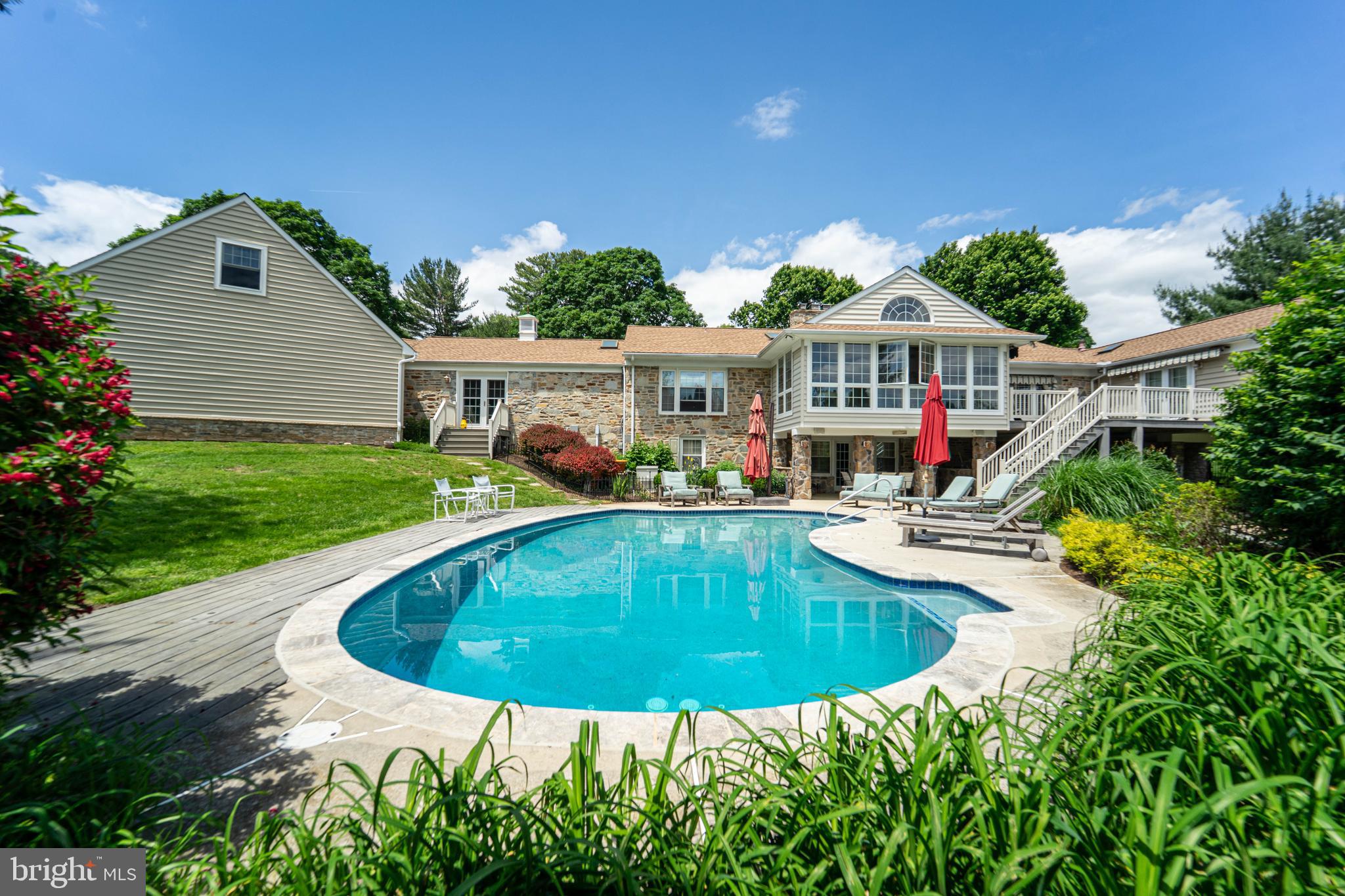605 St Francis Road Baltimore, MD 21286 - Photo 52 of 56 a view of a house with swimming pool and porch