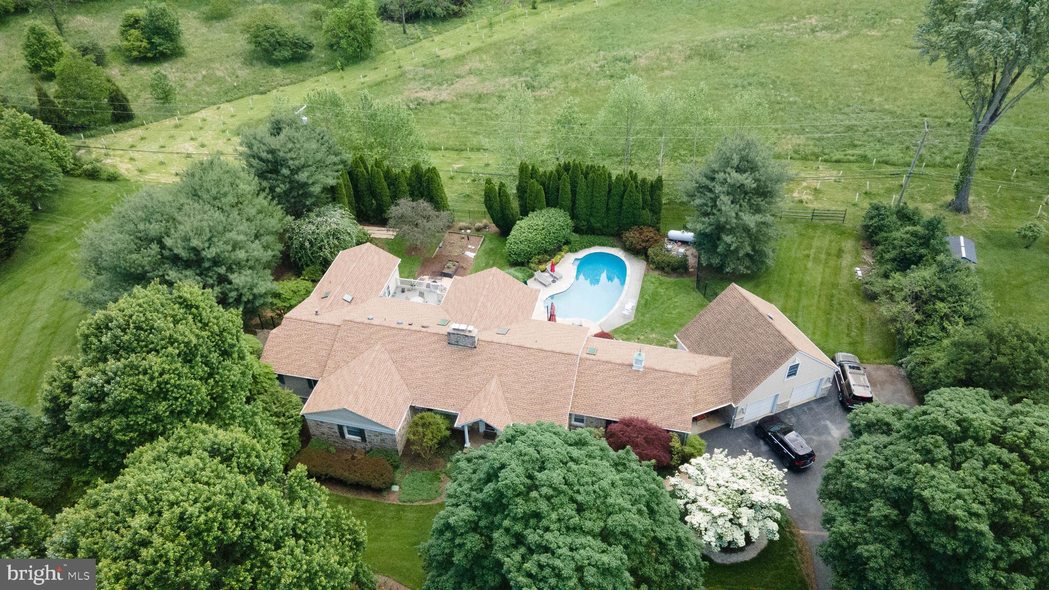 605 St Francis Road Baltimore, MD 21286 - Photo 8 of 56 an aerial view of a house with lots of trees