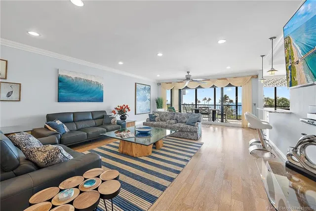 a living room with furniture or couch and a table