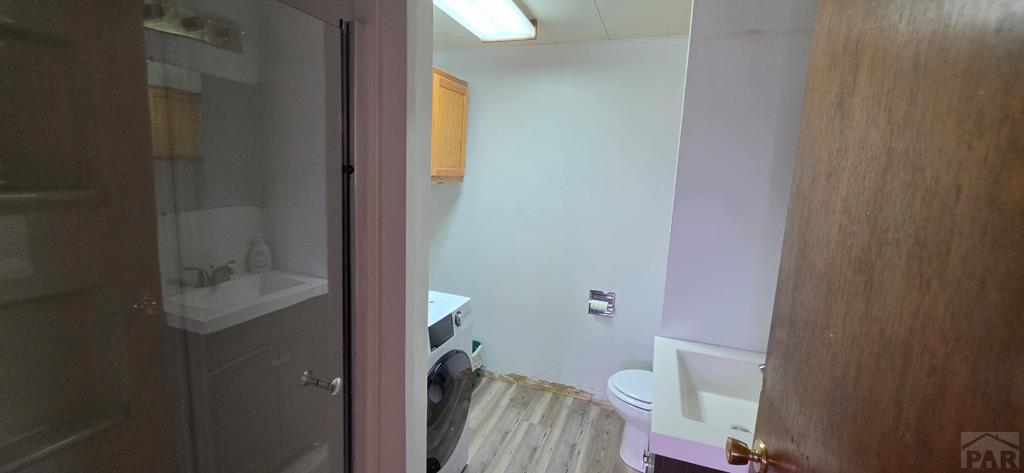 400 Oak Road Lamar, CO 81052 - Photo 21 of 23 a bathroom with a sink and toilet