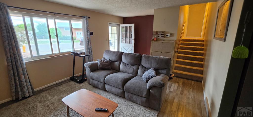 400 Oak Road Lamar, CO 81052 - Photo 10 of 23 a living room with furniture and a window