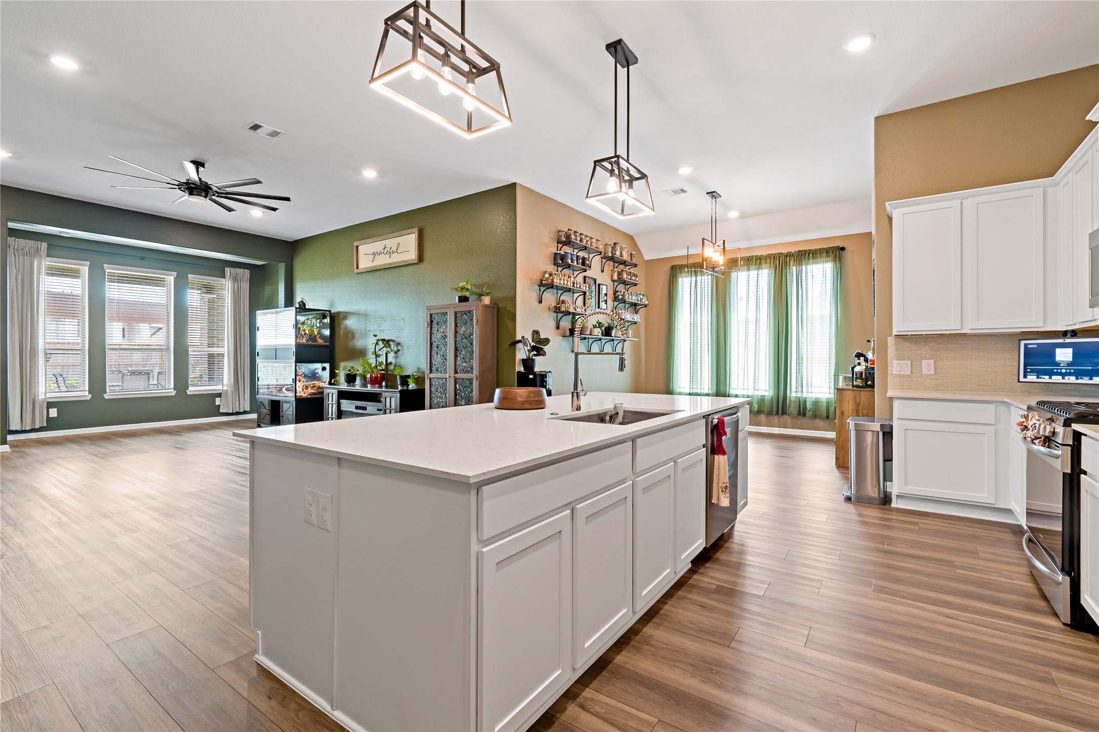 4403 Annandale Lane Rosharon, TX 77583 - Photo 15 of 48 a large kitchen with kitchen island a large island in it
