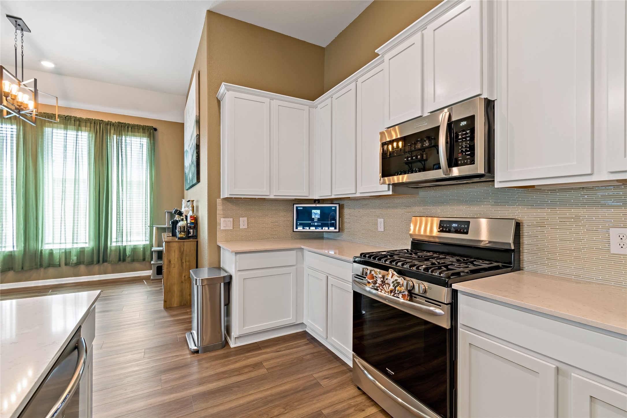 4403 Annandale Lane Rosharon, TX 77583 - Photo 16 of 48 a kitchen with stainless steel appliances white cabinets and a stove top oven