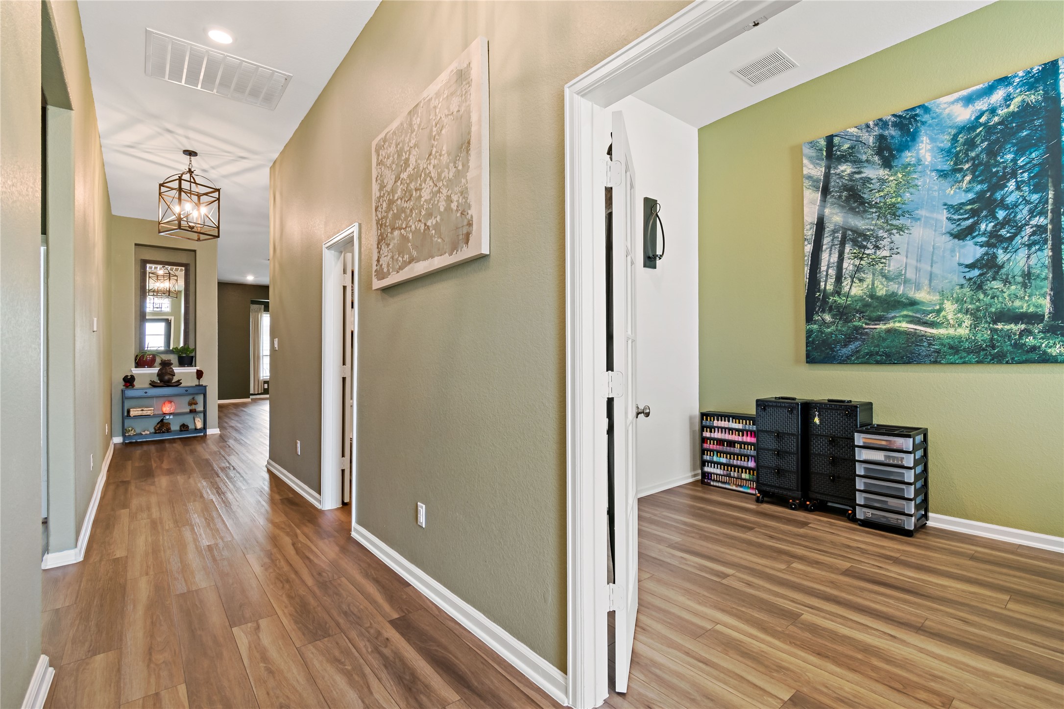 4403 Annandale Lane Rosharon, TX 77583 - Photo 3 of 48 a view of a hallway view with wooden floor and furniture