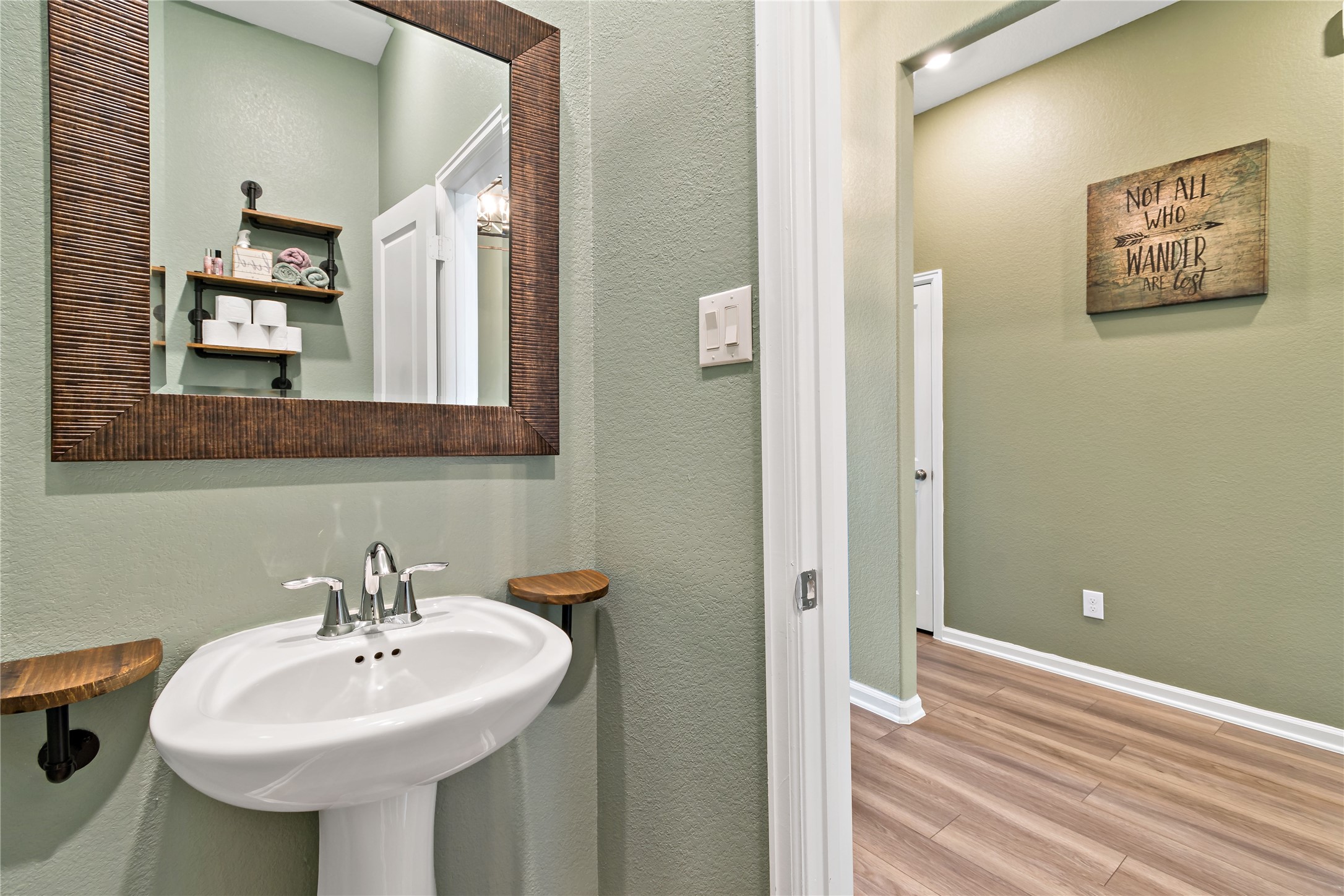 4403 Annandale Lane Rosharon, TX 77583 - Photo 6 of 48 a bathroom with a sink and a mirror