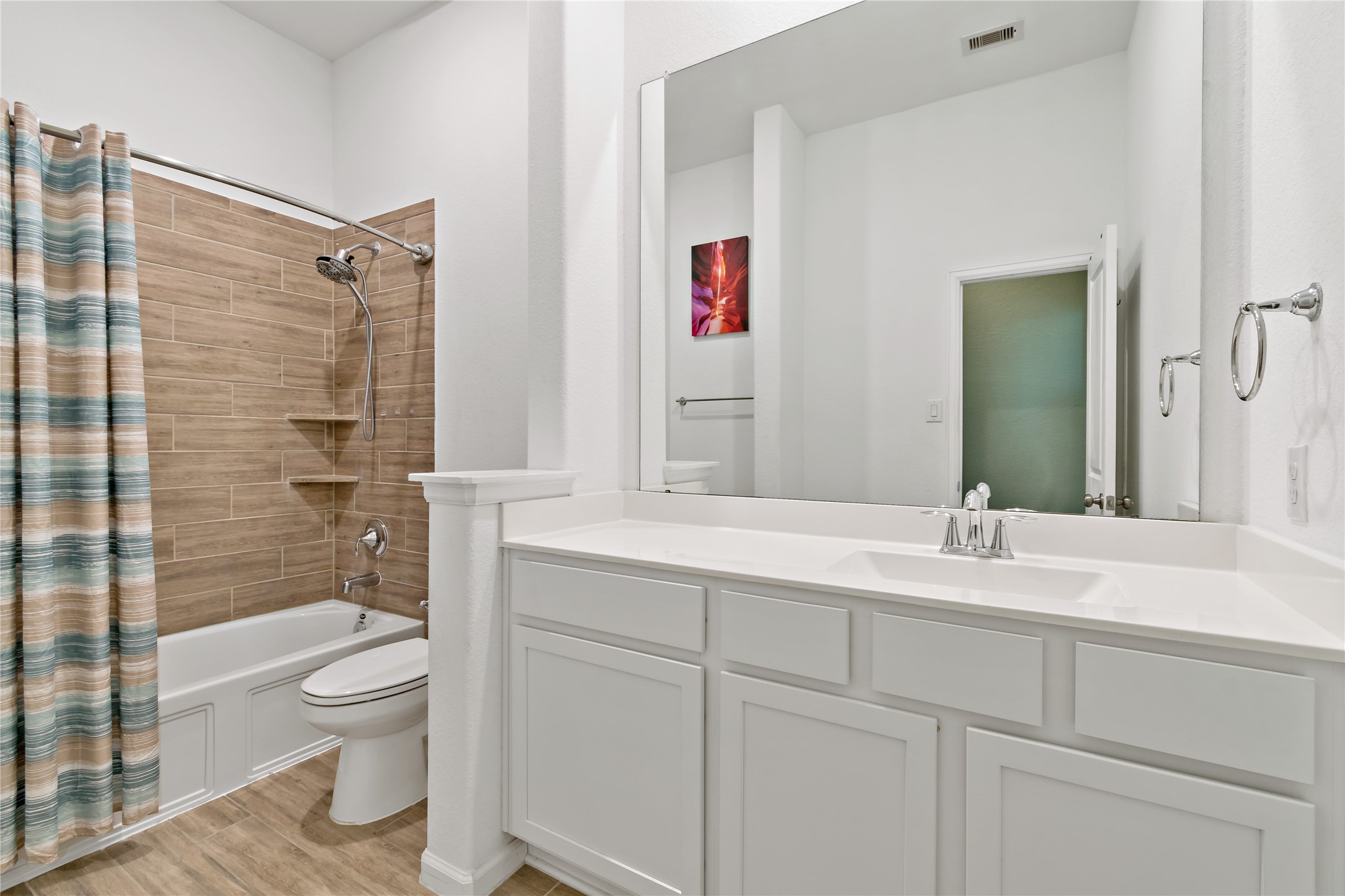 4403 Annandale Lane Rosharon, TX 77583 - Photo 10 of 48 a bathroom with a granite countertop sink toilet and shower