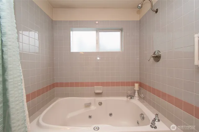 a bathroom with a bathtub
