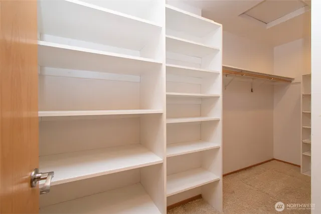 a view of an empty walk in closet