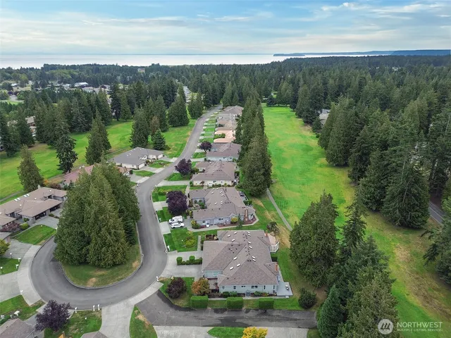 an aerial view of a house with outdoor space