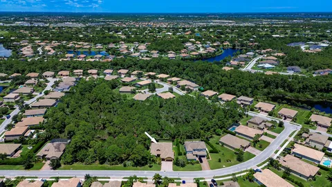 an aerial view of a house having patio