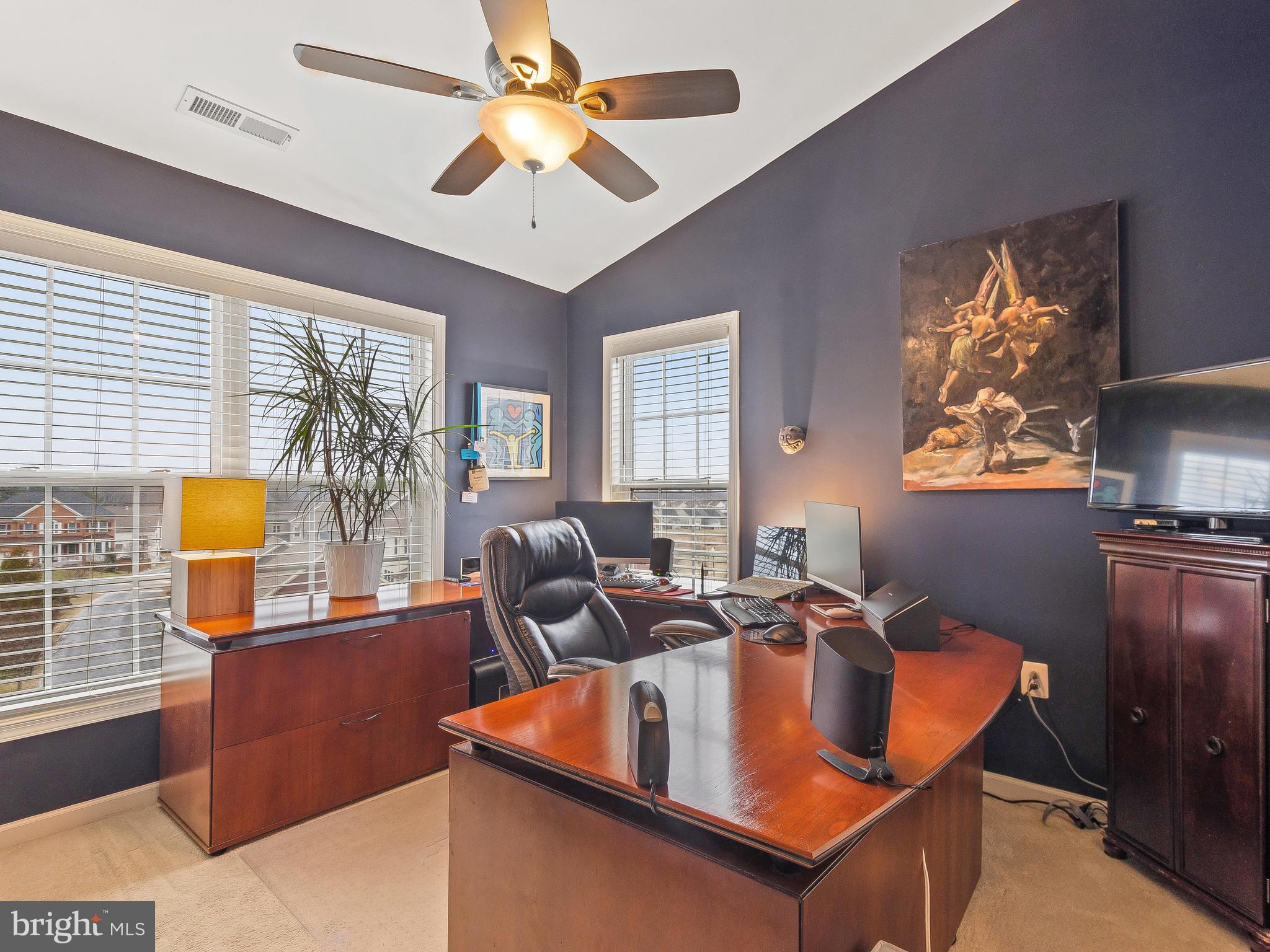 13610 Stargazer Lane Silver Spring, MD 20906 - Photo 31 of 43 a living room with furniture a chandelier fan and a window