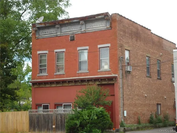 a front view of a building with balcony