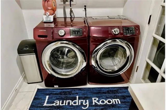 a view of washer and dryer in a utility room